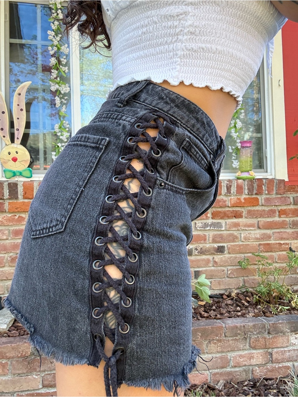 Forever 21 black washed Lace-Up Raw Hem Denim Mini Skirt